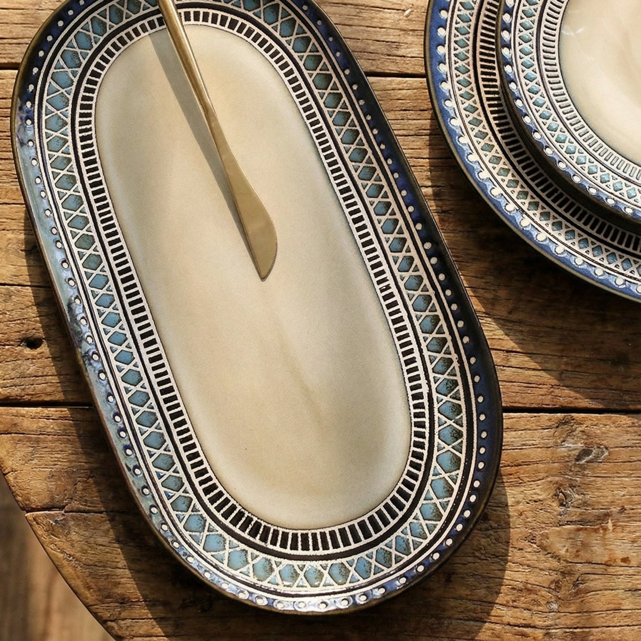 Elegant Ceramic Dinner Plate Set with Intricate Blue and Black Geometric Patterns